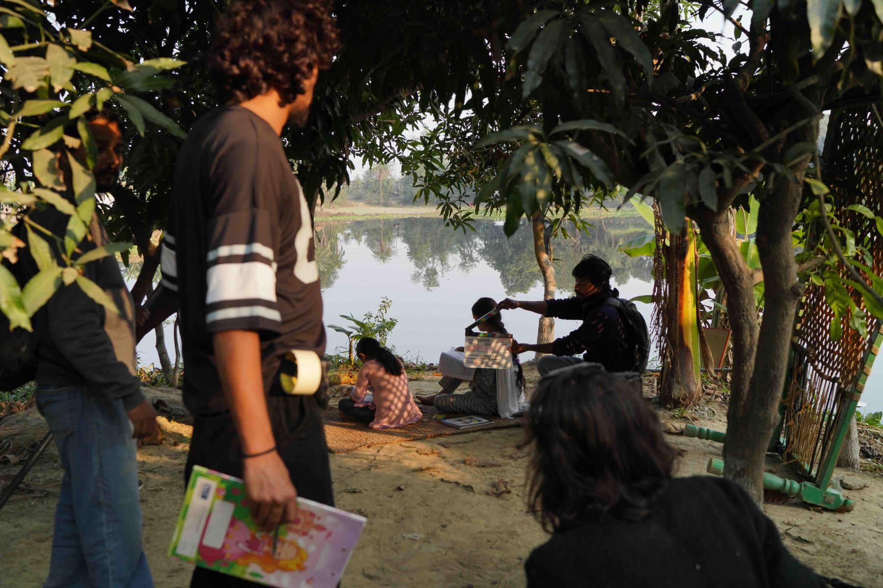 Clapperboard call by the pond, dawn shoot under mango trees
