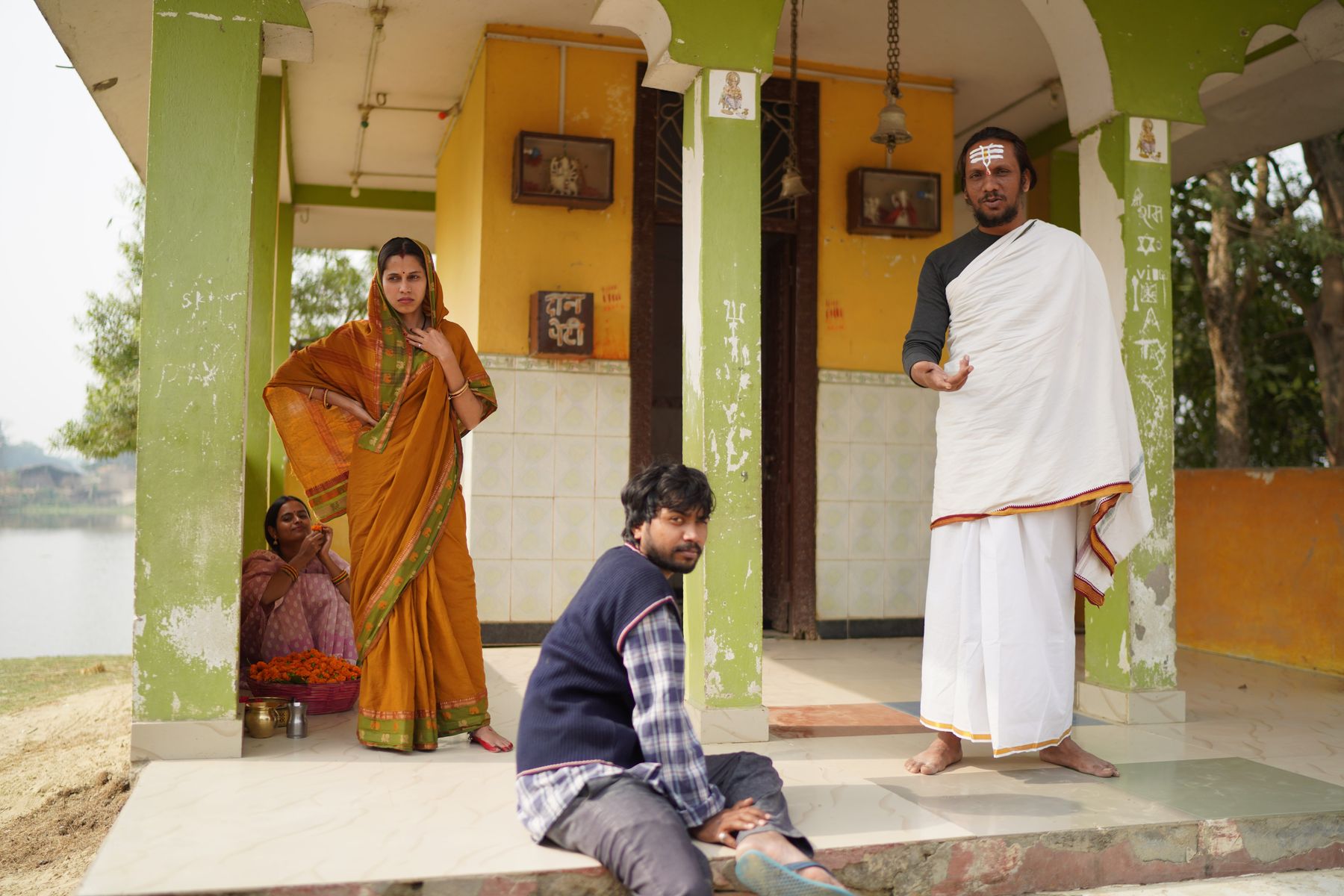 Pundit and family at temple — on-set rehearsal